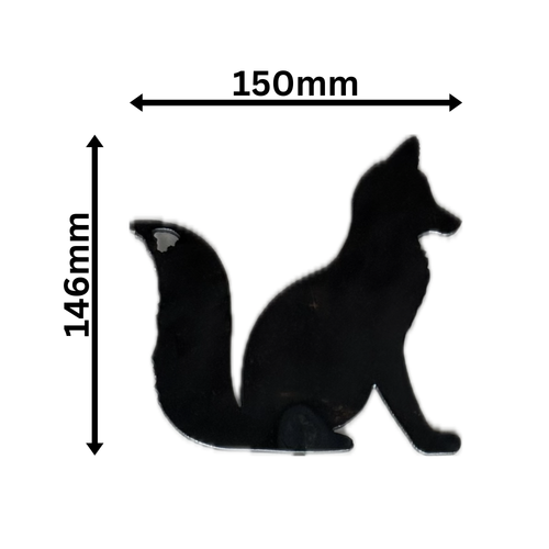 Metal Fox Sitting on a stake